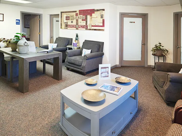 Spacious welcoming waiting room at Ducasse Chiropractic